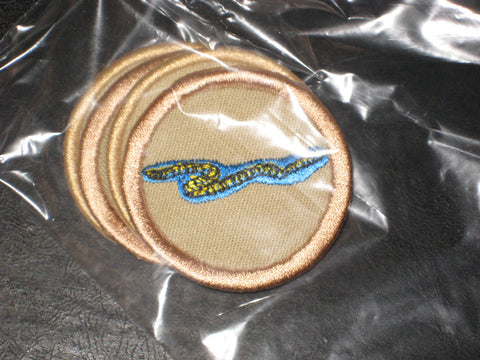 Snake or Worm tan Patrol Medallions Lot of 4