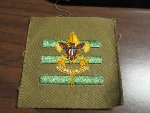 Junior Assistant Scoutmaster On Khaki Square Patch