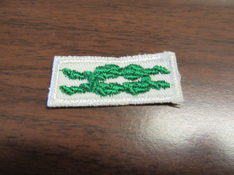 Scouter's Training Award Knot on White gauze back