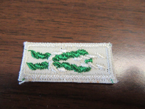 Scouter's Key Award Knot on White gauze back