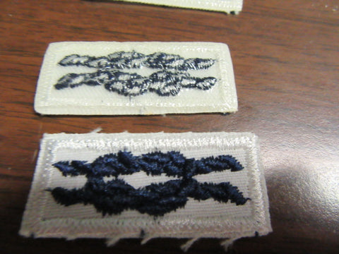 Quartermaster Award Knot on White,  Plastic Back